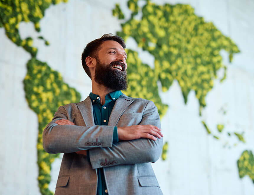leadity ISO and ESG innovation showcase summer 2026 X-Degree compatibility, photo: happy bearded man in front of a green world map