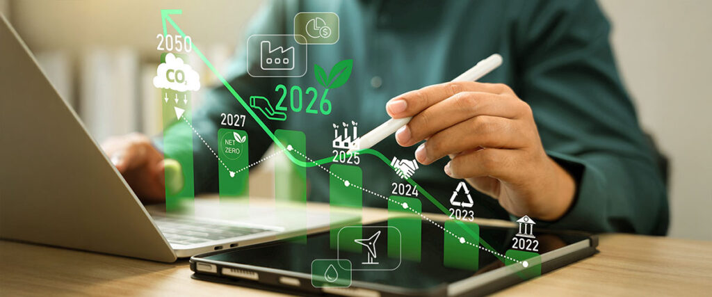 Titelbild Dekarbonisierung Artikel - Mann am Laptop, grüne Statistik