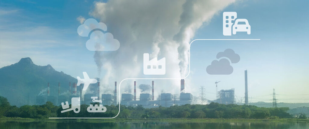 Fabrik mit Klima-Icons im Vordergrund